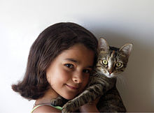 220px_Girl_and_cat.jpg